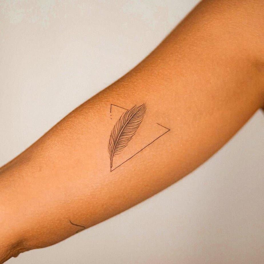 A feather tattoo with a modern twist