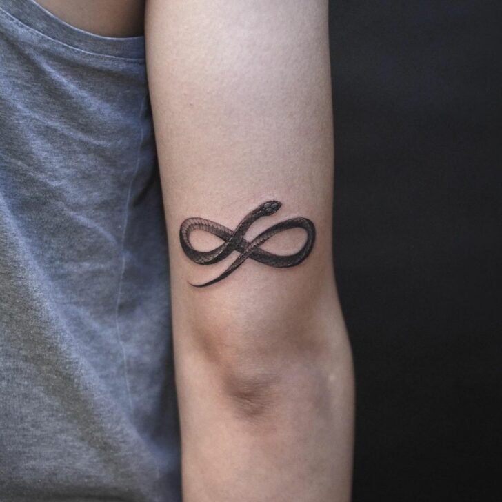 A snake infinity tattoo