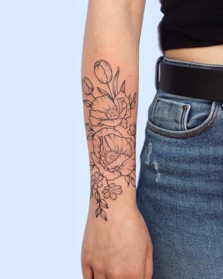 A statement floral tattoo on the wrist