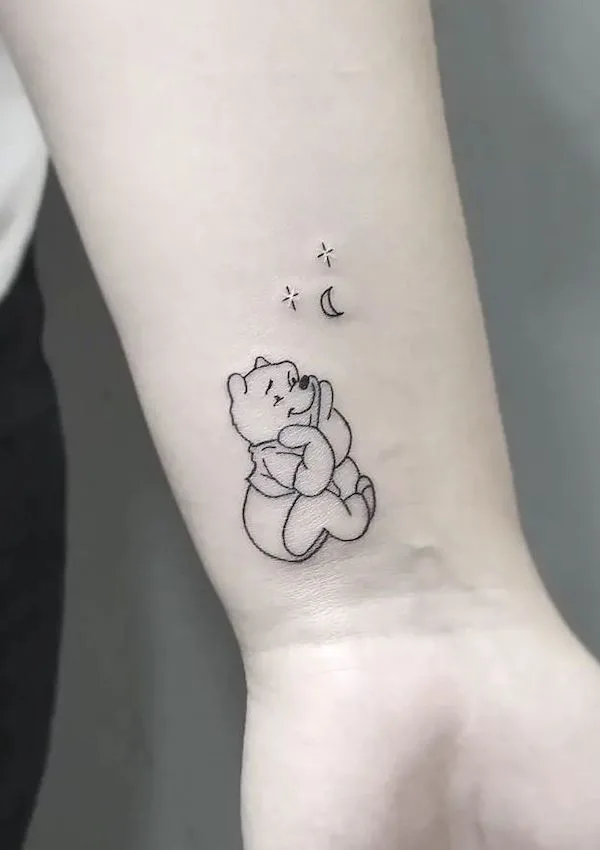 Cute Winnie the Pooh wrist tattoo