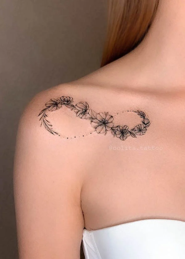 Floral infinity collarbone tattoo