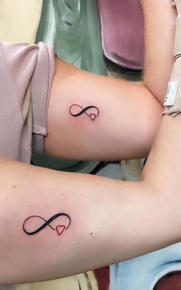 Matching infinity heart tattoos