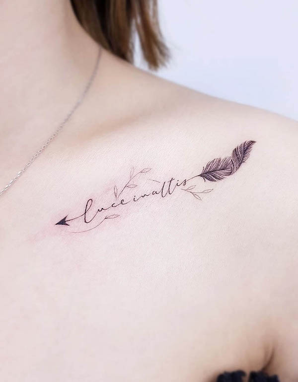 Name and arrow feather tattoo