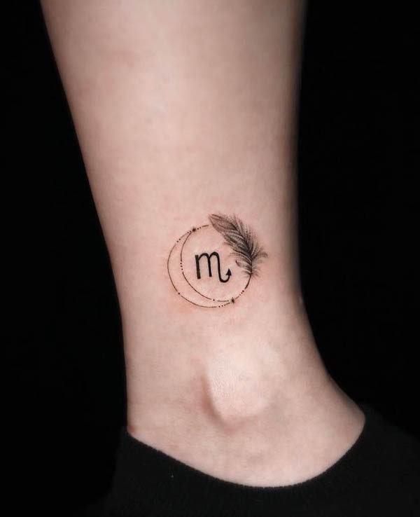 Scorpio feather tattoo