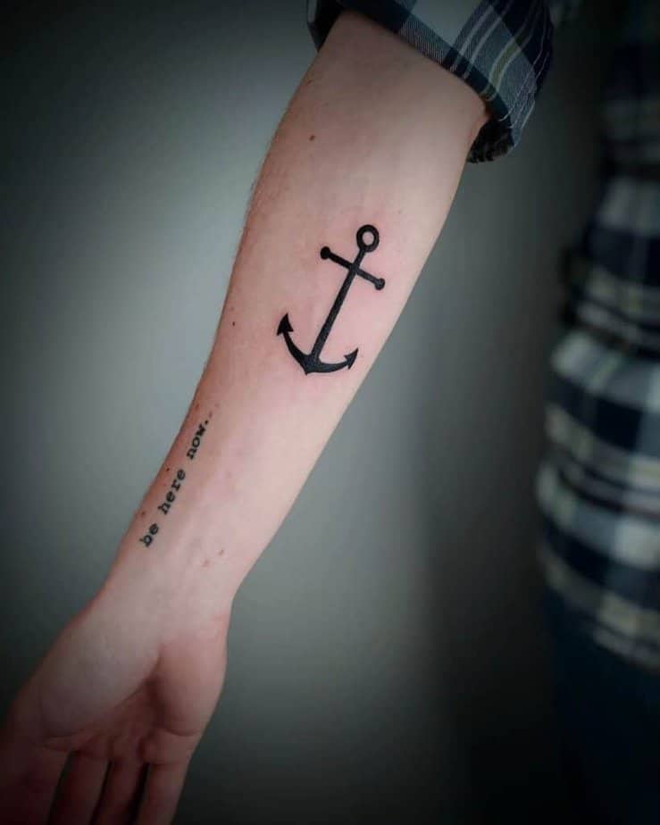 Simplistic black ink anchor on the forearm