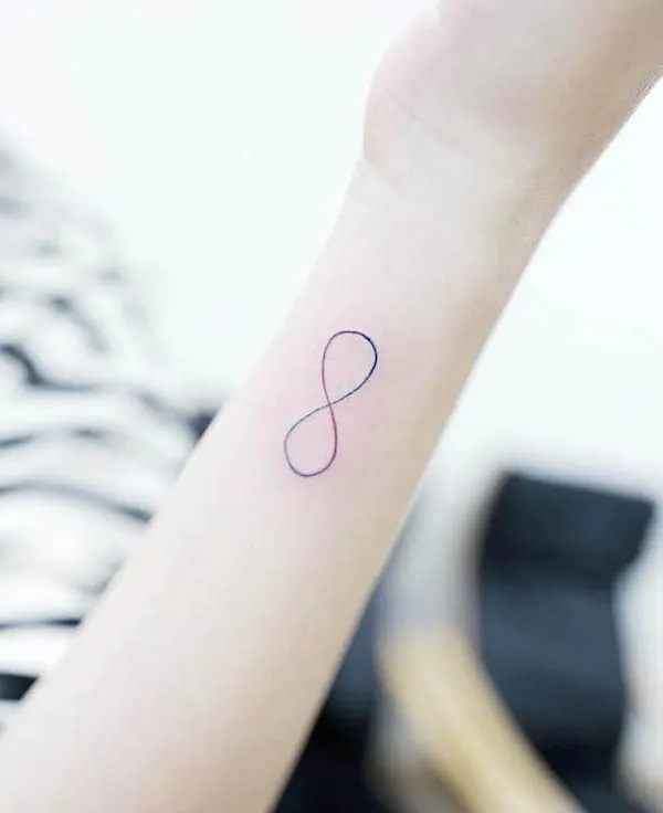 Small iridescent infinity tattoo