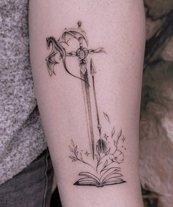 Sword and arrow tattoo