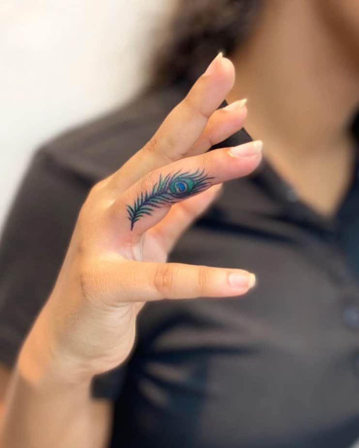 Unique peacock feather tattoo design