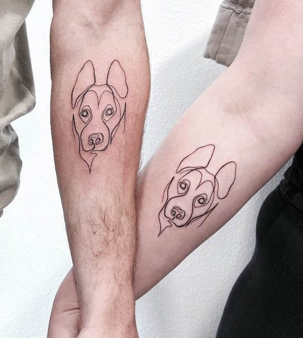 Matching dog tattoos