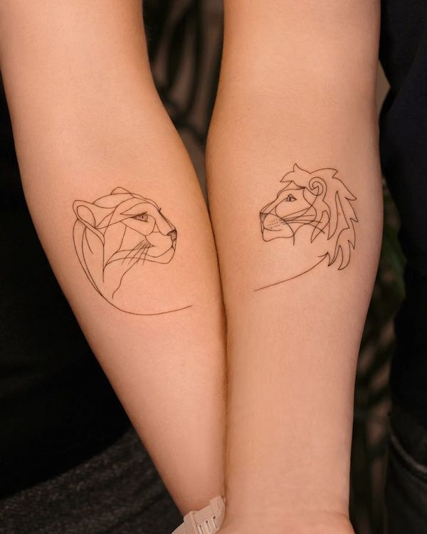 Matching lion one-line tattoos