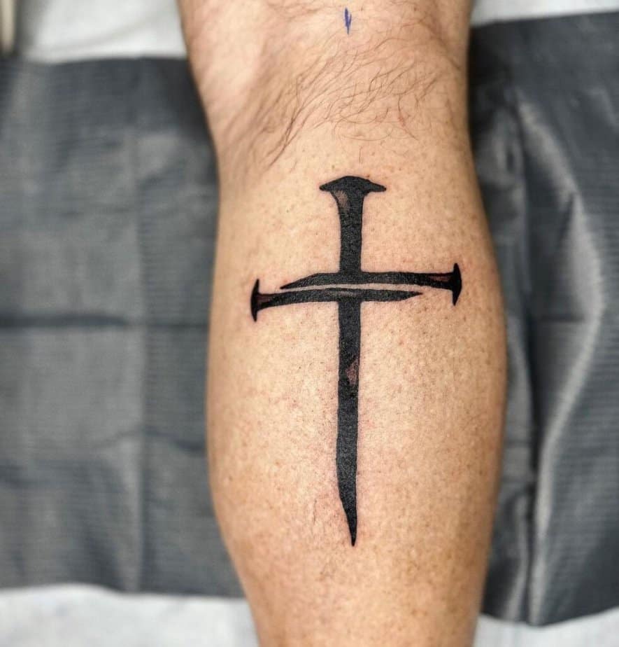 Simple cross tattoo