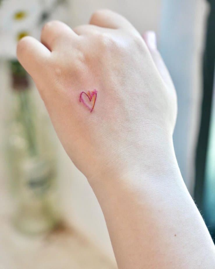 A hand-drawn heart tattoo