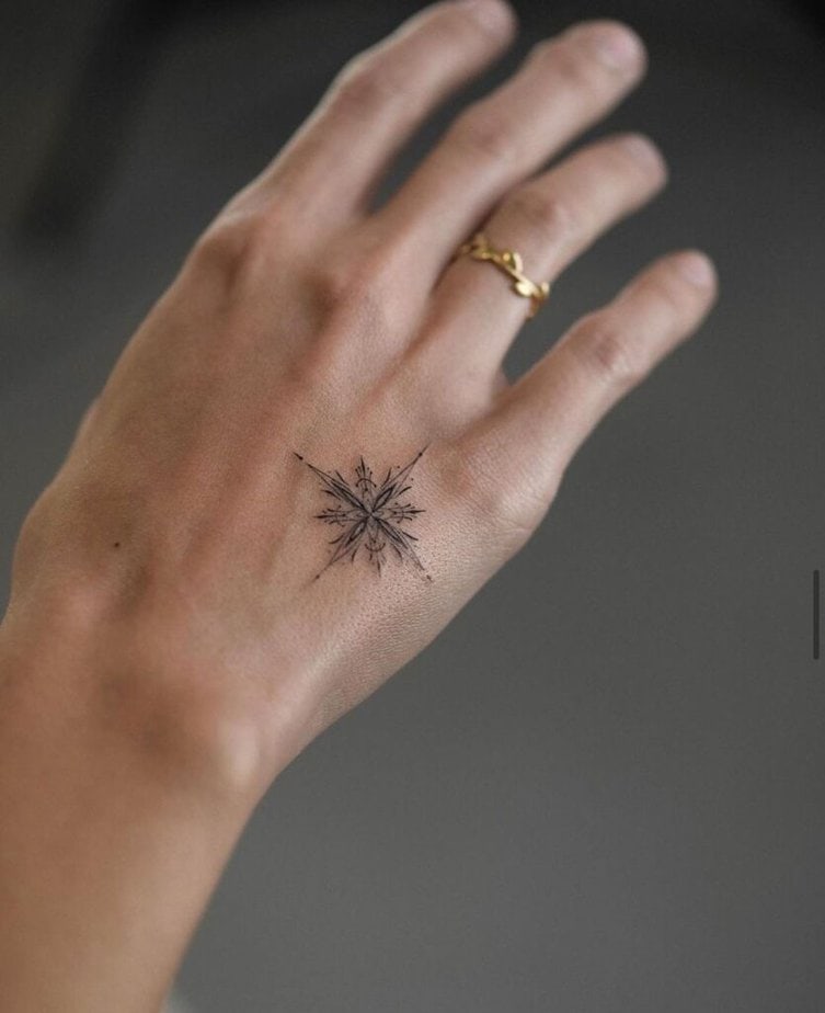 A hand ornament tattoo