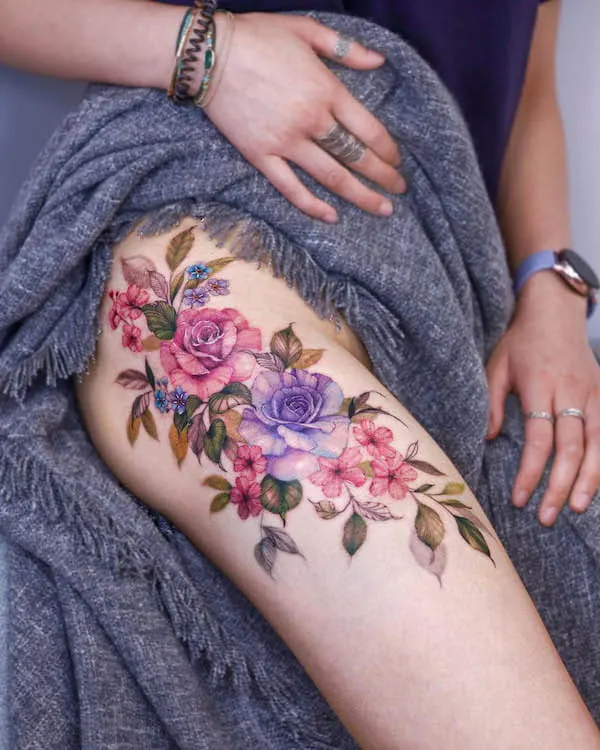 Beautiful flowers thigh tattoo