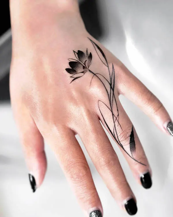 Lotus flower hand tattoo