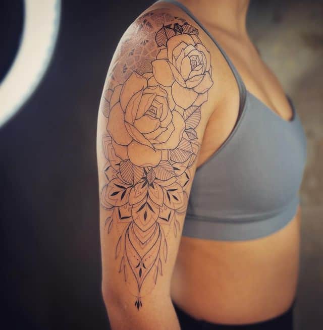 Roses and mandalas half-sleeve tattoo