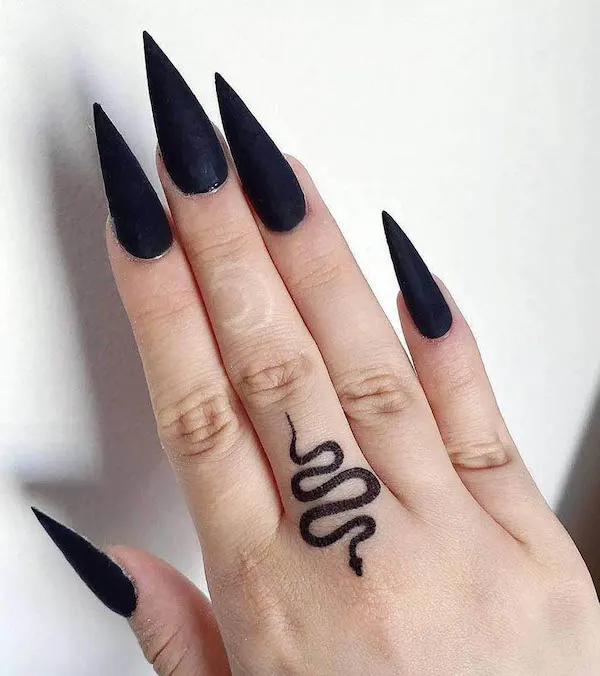 Small snake hand tattoo