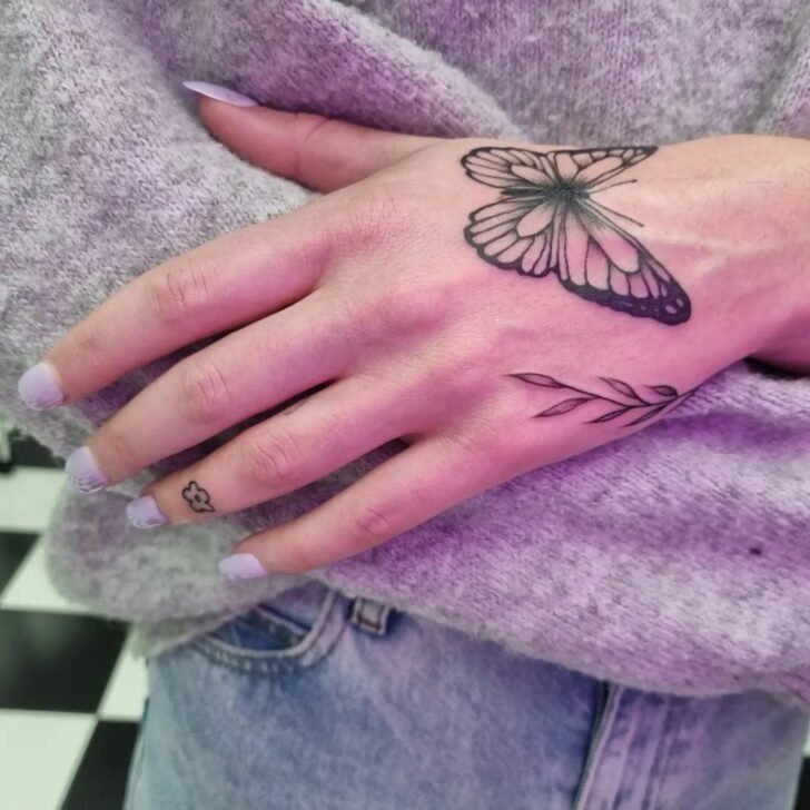 Three small hand tattoos for women