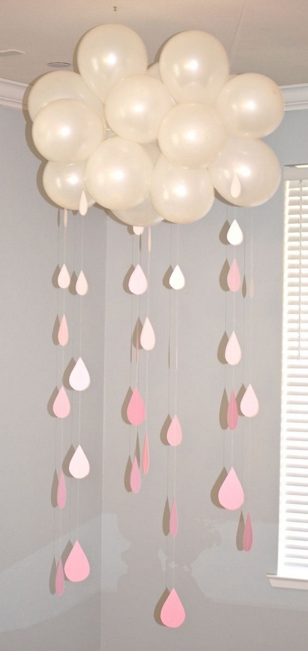 Balloon Decorated With Paper Raindrops For Baby Shower Decor.