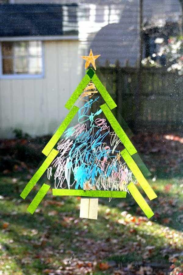 Use Crayola window markers and scotch tape to make a Christmas tree on the window.