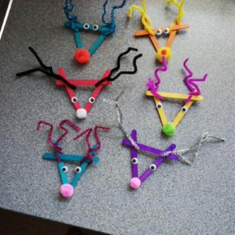 Crafting with a pipe cleaner for Christmas.