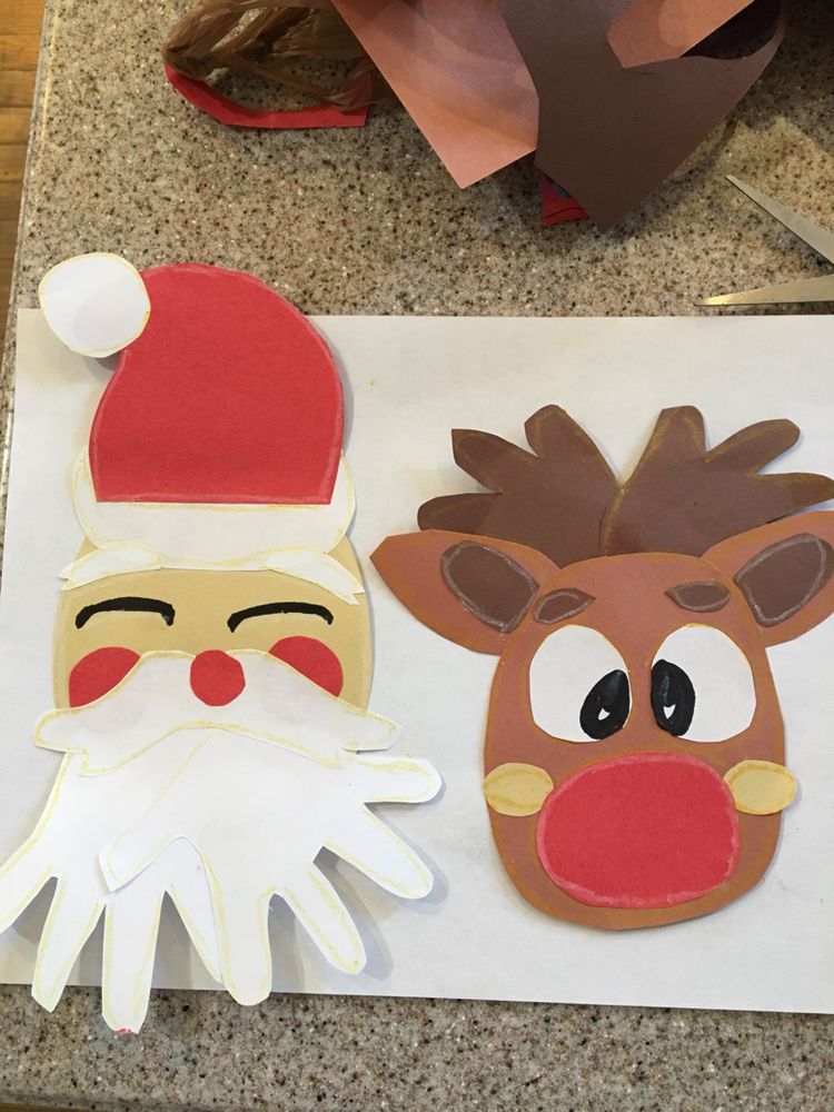 Make these cute keepsake Santa & Rudolph handprint craft.