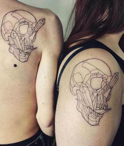 Appealing Skull Couple Tattoo Idea 