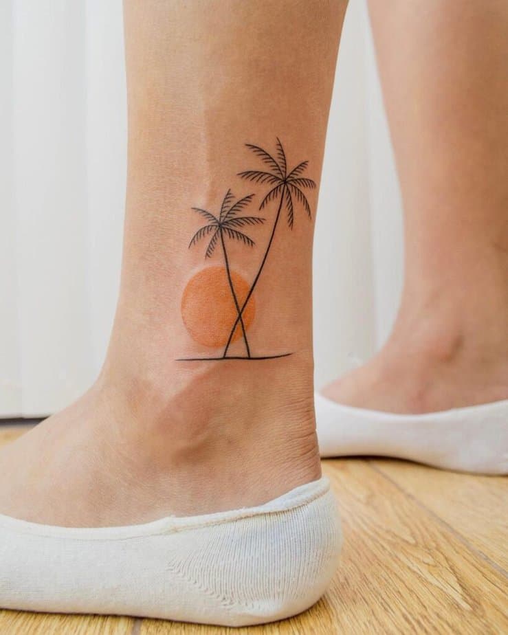 A palm tree sunset tattoo